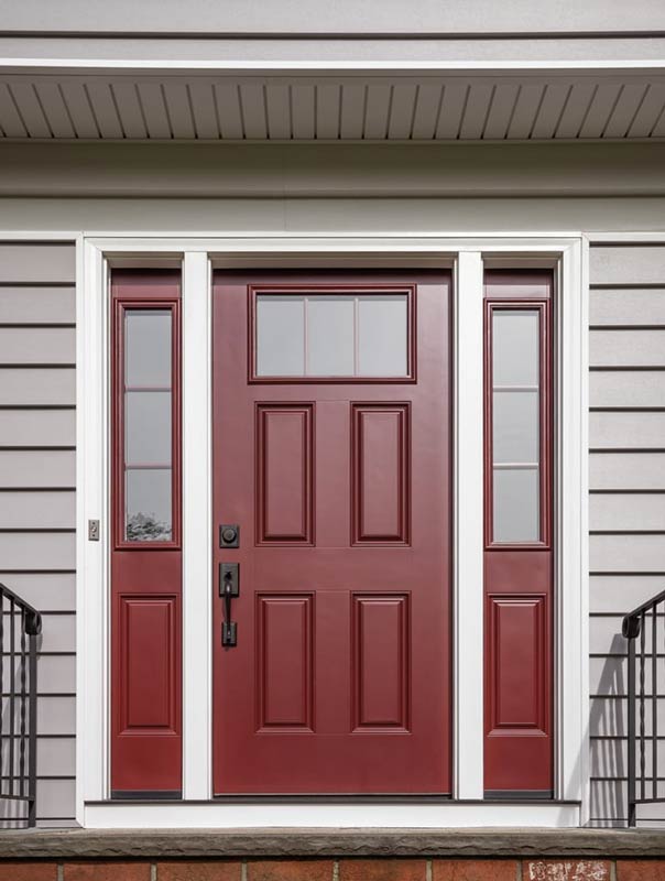 red front door and tan siding