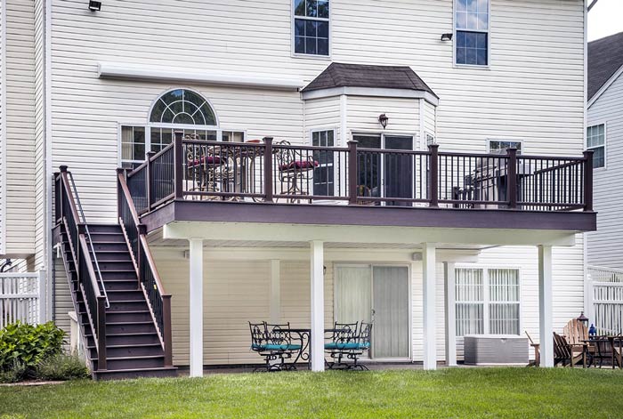 back deck with stairs leading to patio