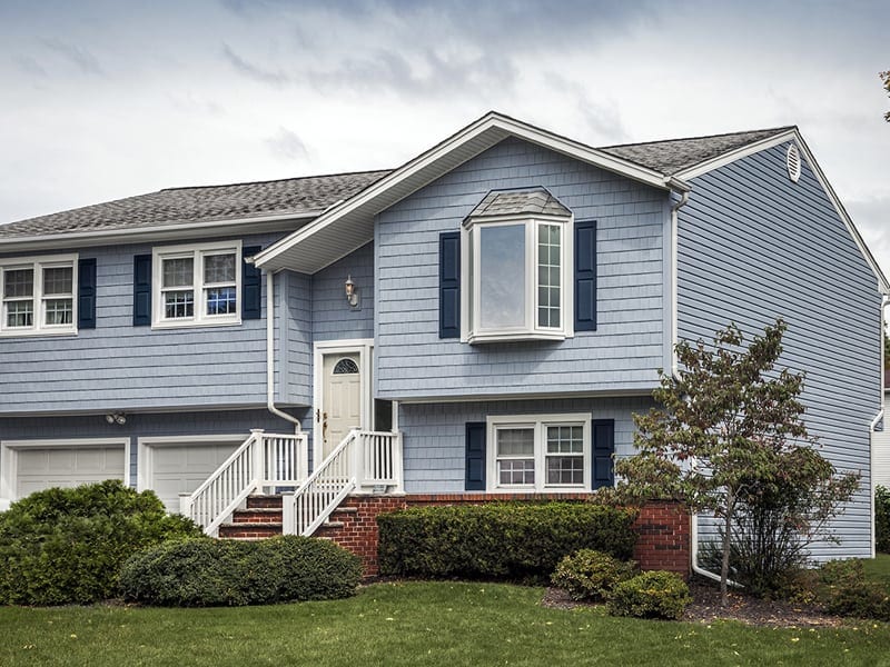 blue house with bay window